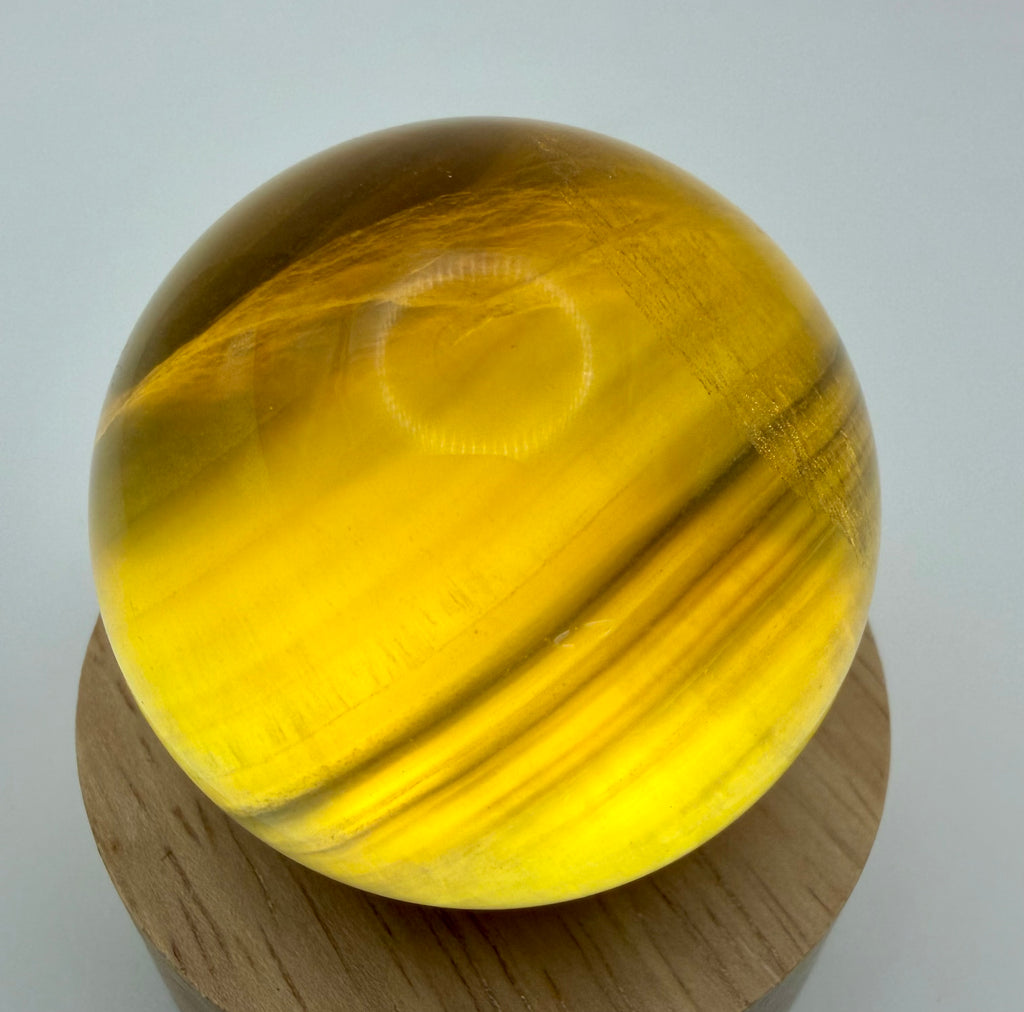 Golden Honey Fluorite Sphere | Natural Amber & Smoky Brown Banded Crystal
