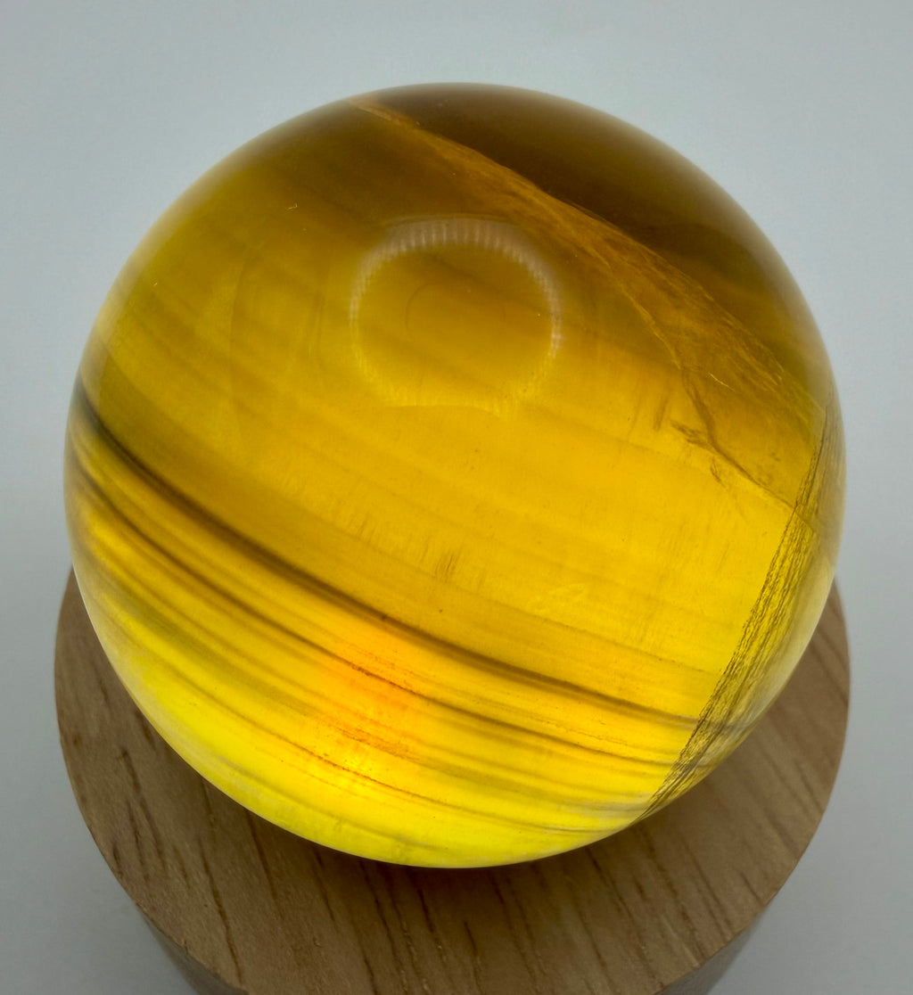 Golden Honey Fluorite Sphere | Natural Amber & Smoky Brown Banded Crystal